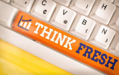Conceptual hand writing showing Think Fresh. Concept meaning a new perspective of thinking when...