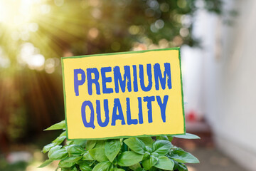 Writing note showing Premium Quality. Business concept for a brand that reaches the degree of the...