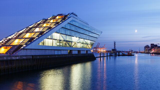 Landmark office building Dockland in the harbor of Hamburg, Germany at nightfall on July 2, 2014.
