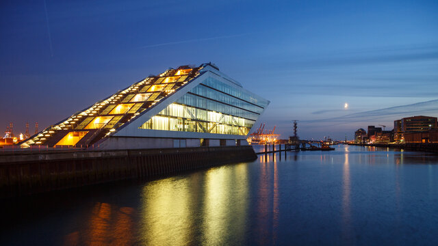 Landmark office building Dockland in the harbor of Hamburg, Germany at nightfall on July 2, 2014.