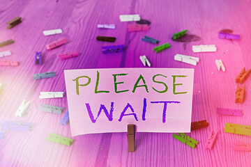 Word writing text Please Wait. Business photo showcasing to pause any implemented action immediately and hold on