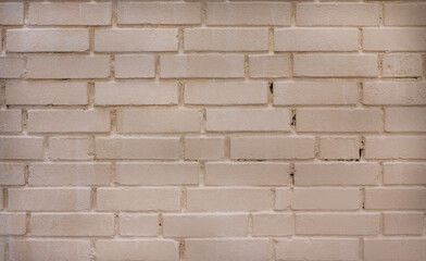 textured brick wall. White and orange masonry bricks.
