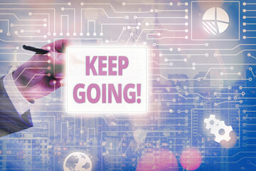 Conceptual hand writing showing Keep Going. Concept meaning to continue living normally despite the...