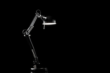 Furniture light. Modern lamp table isolated on black for home night room interior design.
