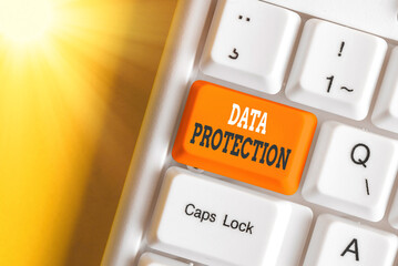 Writing note showing Data Protection. Business concept for safeguarding information away from a...