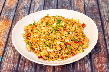 Plate of chaufa rice with chicken