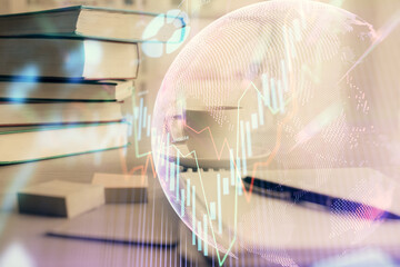 Double exposure of financial chart drawing and desktop with coffee and items on table background. Concept of forex market trading