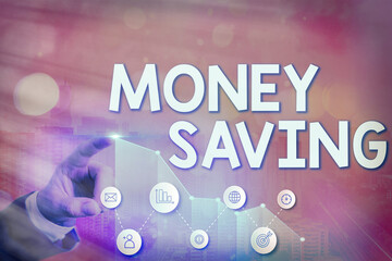 Writing note showing Money Saving. Business concept for investment and deposit in a bank and...