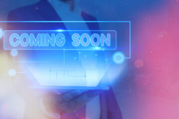 Handwriting text Coming Soon. Conceptual photo an event that is bound to happen in the future or...