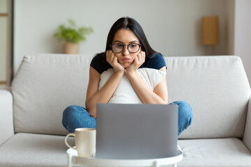 Unemployed Freelancer Girl At Laptop Sitting Having No Work Indoors