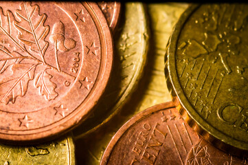 Piled up cent coins as a macro shot.

The focus is on a coin that was minted in 2004. The focus is...