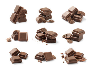 Set with pieces of milk chocolate on white background