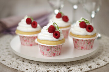 lemon cupcake with whipped cream and raspberry filling