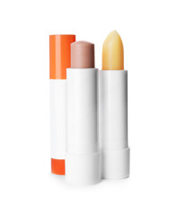 Sun protection lip balms on white background