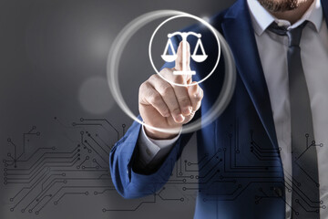 Lawyer touching virtual screen against dark background, closeup