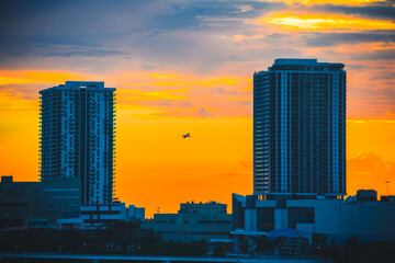 sunset in the city building airplane sun panorama 