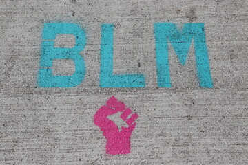 BLM Black Lives Matter Stamp on Sidewalk