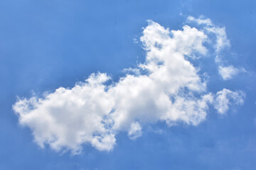 Bright Blue sky with white cloud. Beautiful sky background and wallpaper. Clear day and good weather in the morning.  
