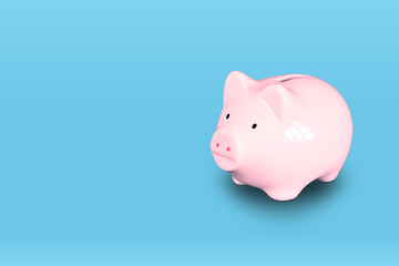 Pink Piggy Bank Isolated on Blue Background