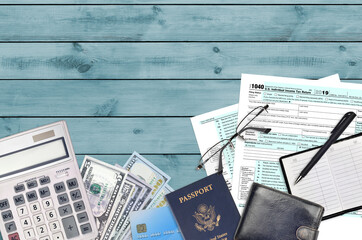 IRS form 1040 Individual income tax return lies on flat lay office table and ready to fill. U.S....