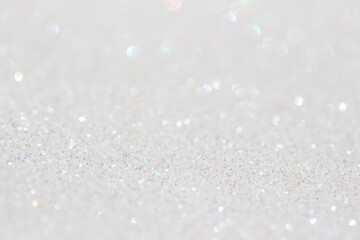 White color macro abstract glitter texture background with copy space and bokeh