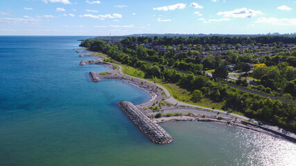 Beautiful Aerial View of Lakeside Park with Blue Sky and Train and Beautiful Rock Beach