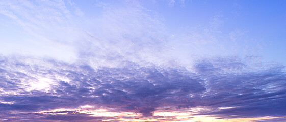 Naklejka na ściany i meble Panorama photography of twilight cloudy sky and moon