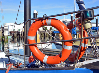 Safety at Sea - Orange Life Buoys on a Yacht Deck