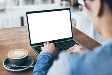 computer mockup image blank screen.hand woman work using laptop with white background for...