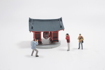  small photographer model figure take the photo at travel