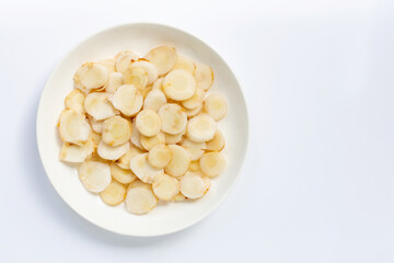 Fresh galangal slices  isolated on white