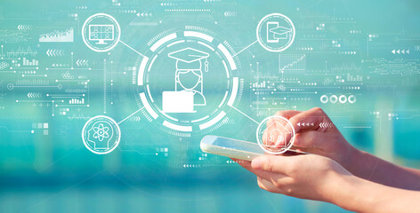 Distance learning theme with person holding a white smartphone