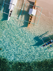 Aerial photos of Guyam Island, a tear-drop shaped island in the Philippine Sea situated around 2 kilometres south-southeast of General Luna municipality. Popular stop for tourists doing island-hopping