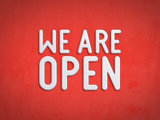 Naklejka premium We are open - text on a red textured background