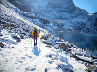 Trekker at Nepal Langtang National Park, Langtang Valley. Trekking on snow mountain; majestic...