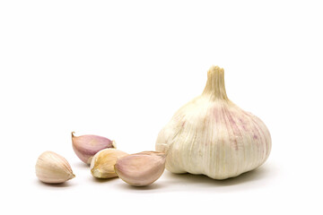 Close up raw garlic with segments isolated on white background
