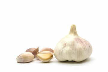 Close up raw garlic with segments isolated on white background