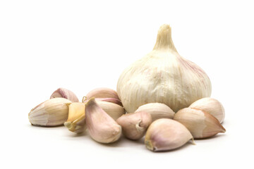 Close up raw garlic with segments on white background