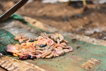 Chicken intestines are showcased  on a market in china for sale.