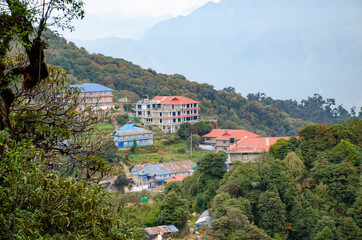 Fototapeta na wymiar landscape houses in the mountains of Nepal autumn Himalayas