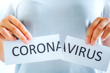 End of Covid-19 pandemic Asian woman tearing card Victory in fight against Pandemic Cure corona...