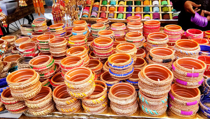 A stall selling women's bangles. This bracelet is a great accessory for india women and fans of traditional Indian accessories