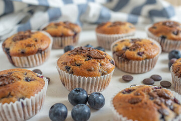 sweet home made chocolate blueberry muffins on a table