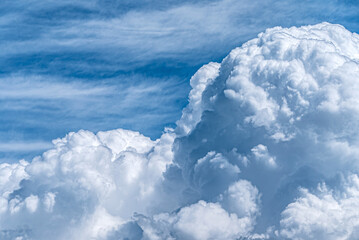 white fluffy clouds in the blue sky