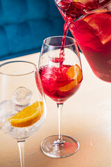 cold sangria with fresh fruits and berries