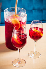 cold sangria with fresh fruits and berries