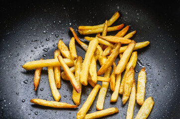 french fries in a frying pan
