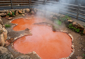 Kamado Jikoku (means Cooking Stove Hell) in Japanese, one of the eight hells in Beppu, Oita, Japan. It is a hot spring in pale red