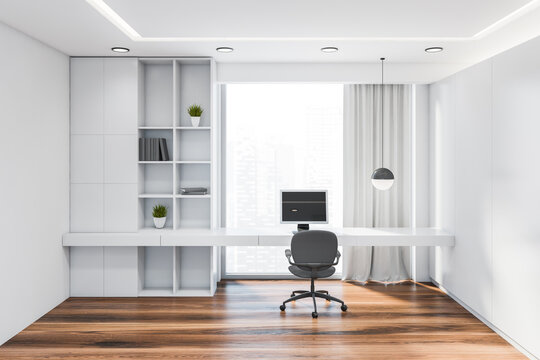 Minimalistic White Home Office With Bookcase