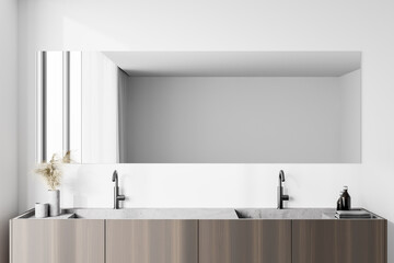Double sink in white bathroom interior